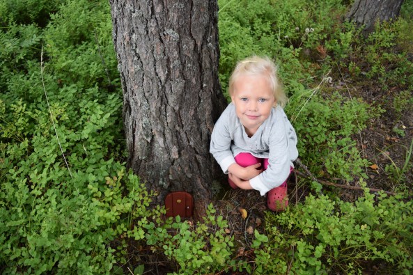 Maja alongside the door
